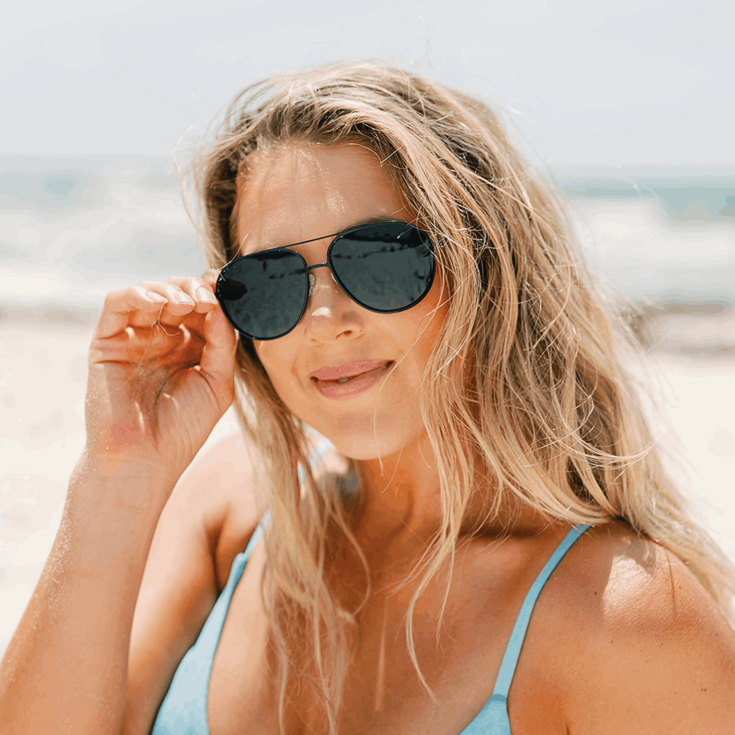 OLLIE: ONYX Blue Eye Sunglasses