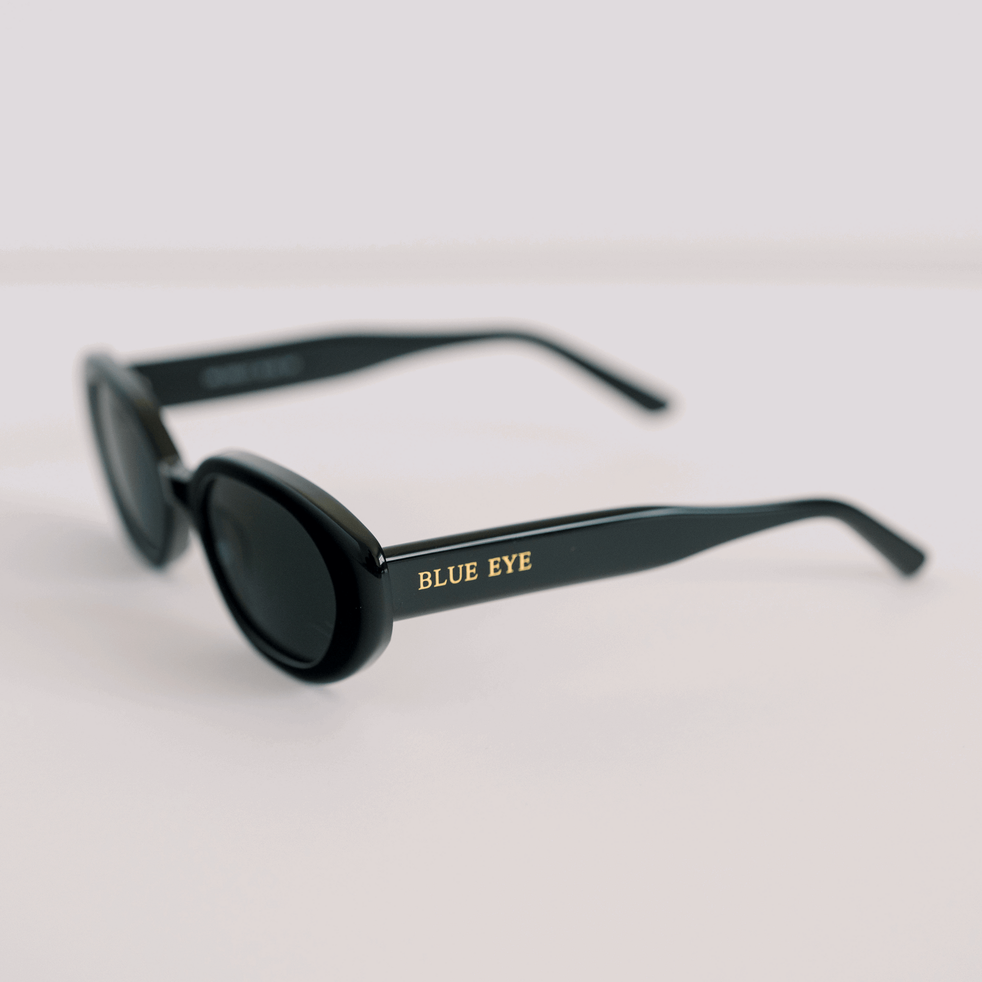 WINNIE: MIDNIGHT BLACK Blue Eye Sunglasses